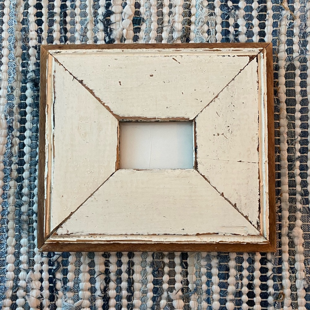 Handmade wooden white frame. Like new. Frame is 7.25” x 8”.